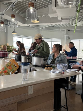 DP Employees filling up their bowls with chili to try