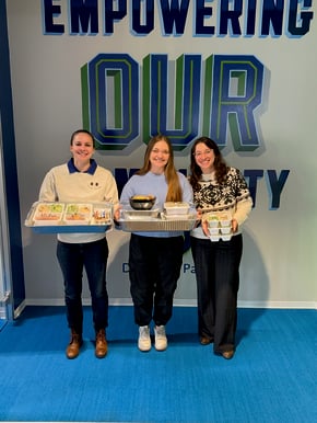 3 Dominion Payroll individuals holdings trays of food they plan to deliver to community fridges in richmond