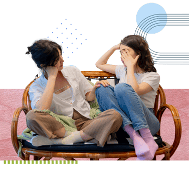 Two women sitting on a wicker bench, one wearing brown pants and white shirt, the other in jeans and a white t-shirt, with abstract graphic elements. One friend comforting the other as they speak.