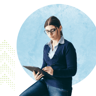 Person in a navy sweater and white collared shirt sitting, writing on a clipboard against a blue circular background.